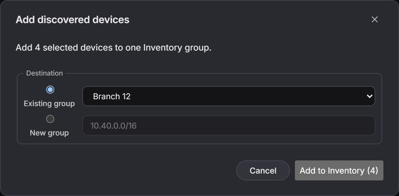 The Add discovered devices dialog, choosing an existing Inventory group for four selected devices